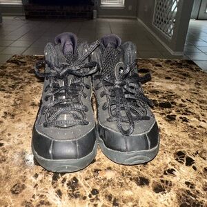 Black little posite Nike